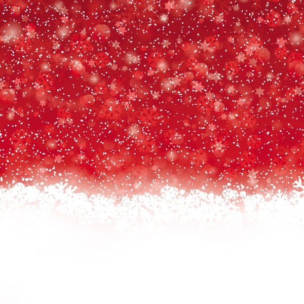 红色和背景虚化的背景与雪的圣诞节