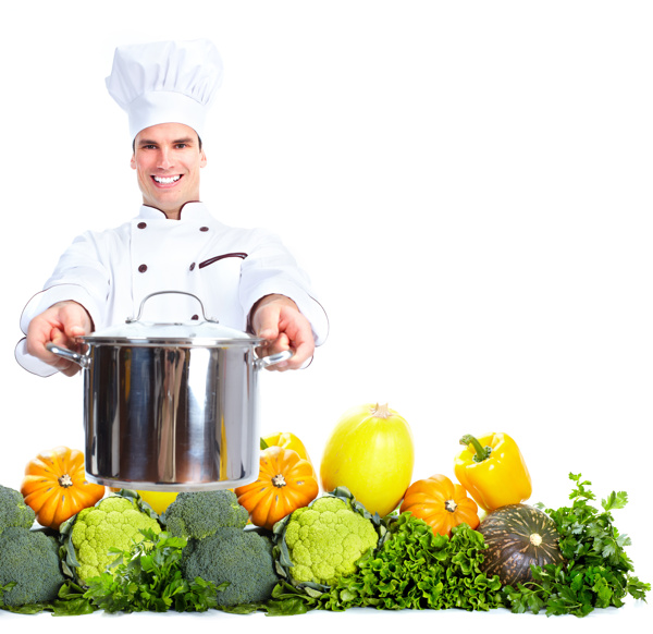 蔬菜上拿着锅具的外国厨师图片
