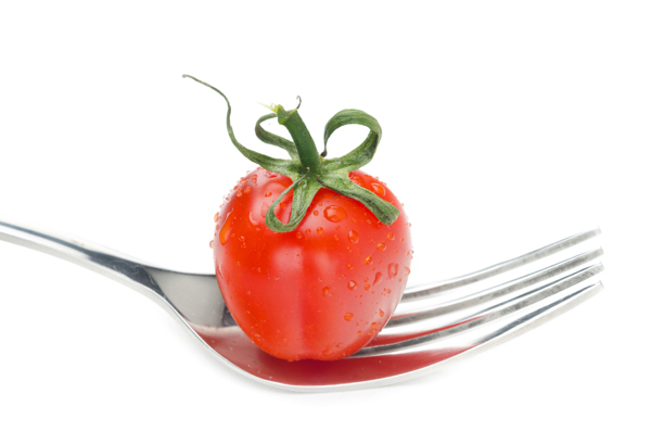 叉子上的西红柿图片