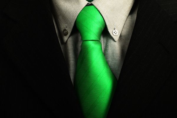 绿色领带黑色西装图片