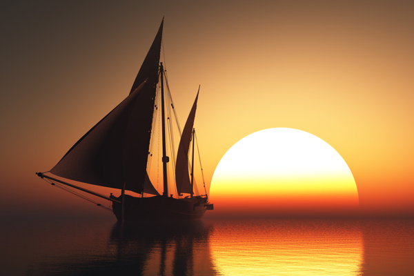 海面的船只和落日图片